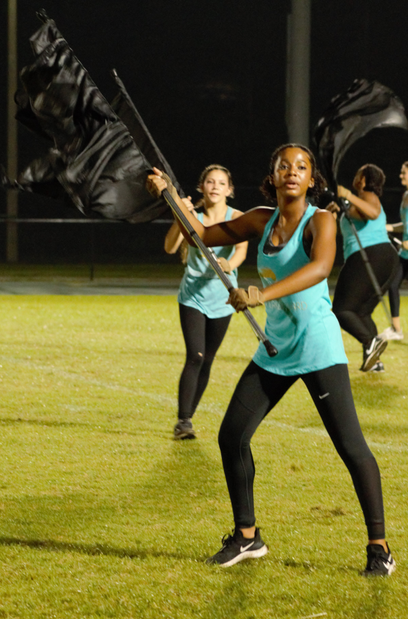 Jayda Thomas performs a portion of the Color Guards show, Monopoly.