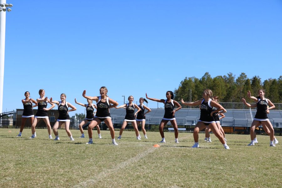 Cheerleaders put on a dance performance at our pep rally before the Butter Bowl game.
