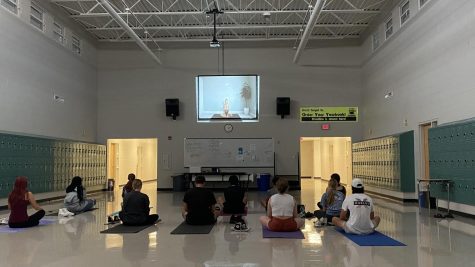 Students gather for yoga club.