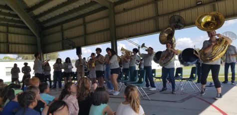 Soaring Sound members play stand tunes for Oakstead Elementary students.