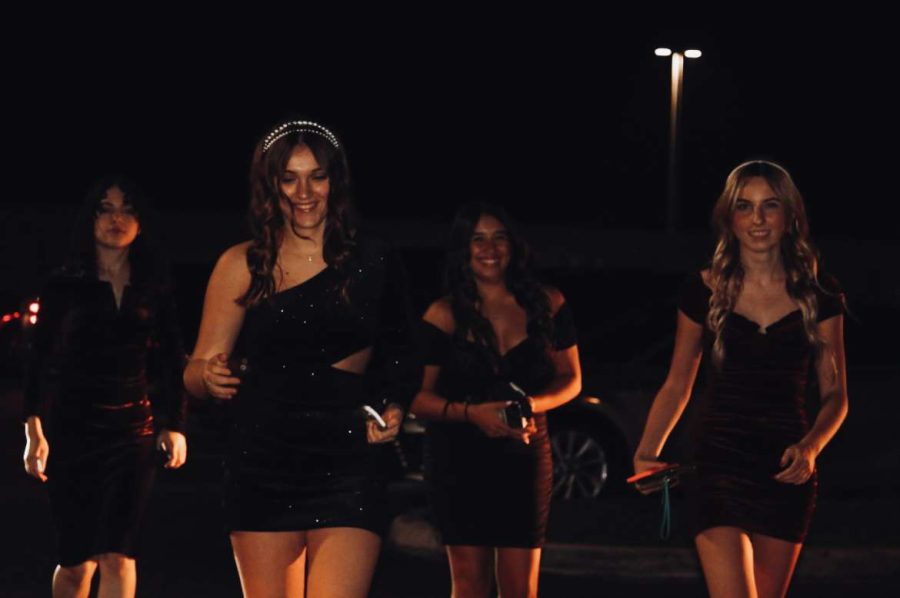 Cadyn Larscheid, a Sophomore at Sunlake, and her friends enter the dance ready to have a blast.