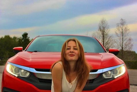 Tamara Carver poses in front of her 2016 Honda Civic.