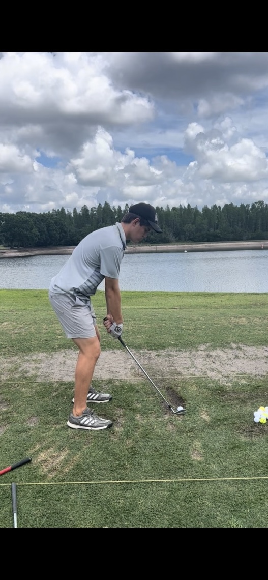 Junior Maximus Haines, at the golf course looking to improve himself to get ready for district competetion coming up soon. 
