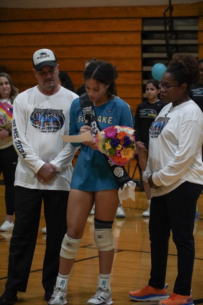 Senior Anysha Audrey saying her senior speech to the crowd. She shows her gratitude towards the coaches and states to her teammates, ...I wish you all the best and I want you all to grow and learn from our coaches.”