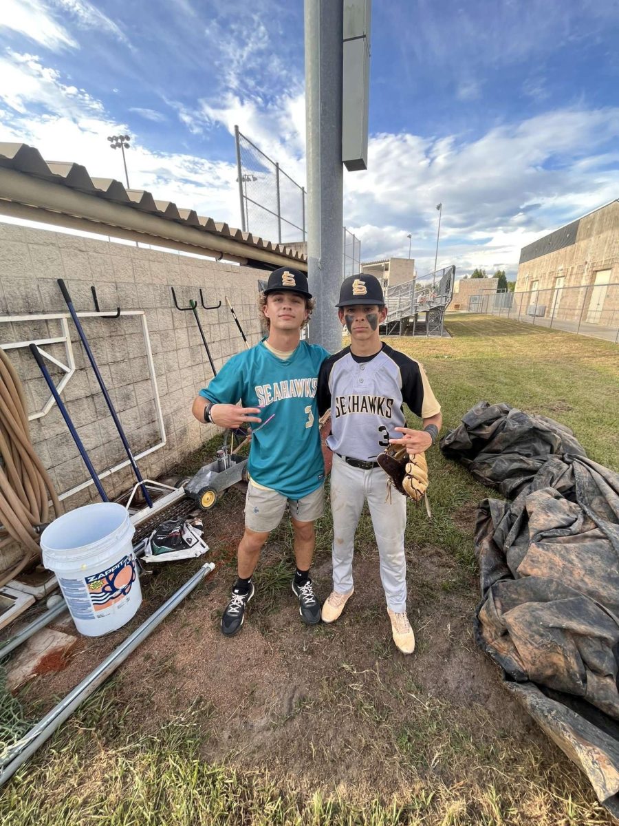 Sophomore Gavin Clarke (left) and junior Mario Perez (right) taking a picture before a baseball game. Sunlake won their game against Zephyrhills High School. Gavin stated, Im so happy we won.
