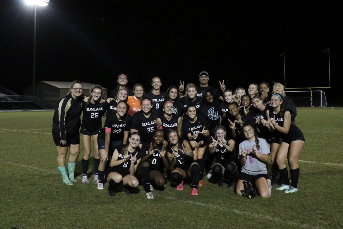The team celebrates their 1-0 win on their home field. The team has a strong bond, and as Claudia Montealegre says, “…has a created so many lifelong friendships.” It has also “…welcomed several girls to be a part of this amazing experience.”