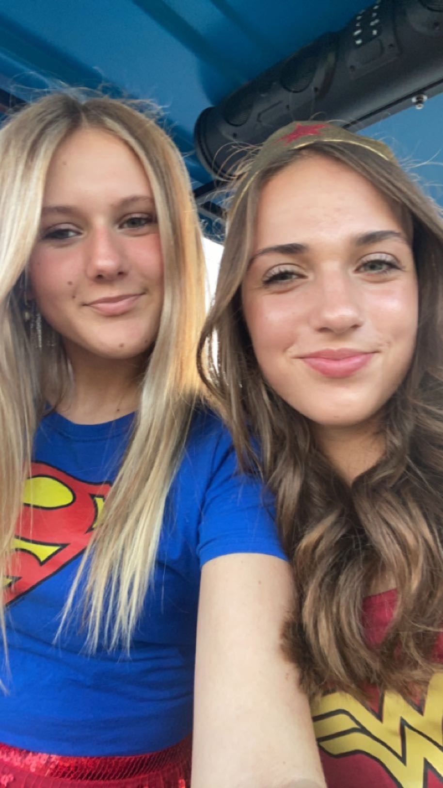 Freshmen Alexa Miller and Allison Poll taking a picture on Halloween. Alexa is dressed as Superman and Allison is dressed as Wonder Woman. Alexa stated, Halloween is one of my favorite holidays; I love decorating and finding cute costumes.