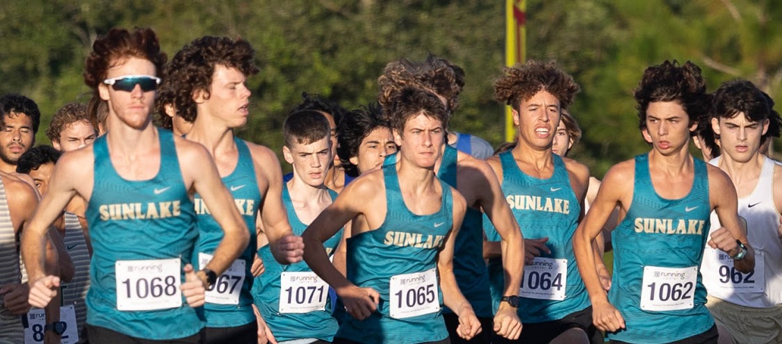 This is a photo of the boys in a pack at the start of the race. "Starting the race next to my teammates makes me feel powerful. We're a great team that is known, and I love being able to run on a team with such competitive boys."