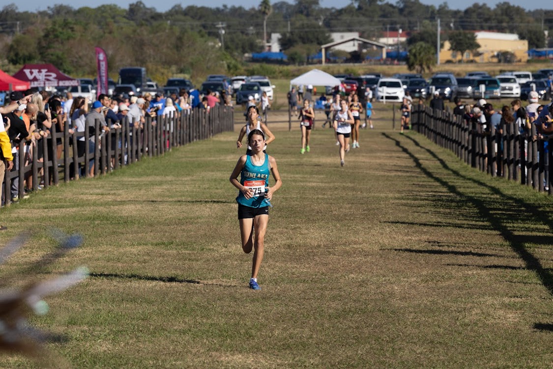 This is Leah on the final straightaway, sprinting for the finish. “I could see the finish right there, with the seconds counting down. When I see the finish like that, I speed up and get super excited that my race is finished.”