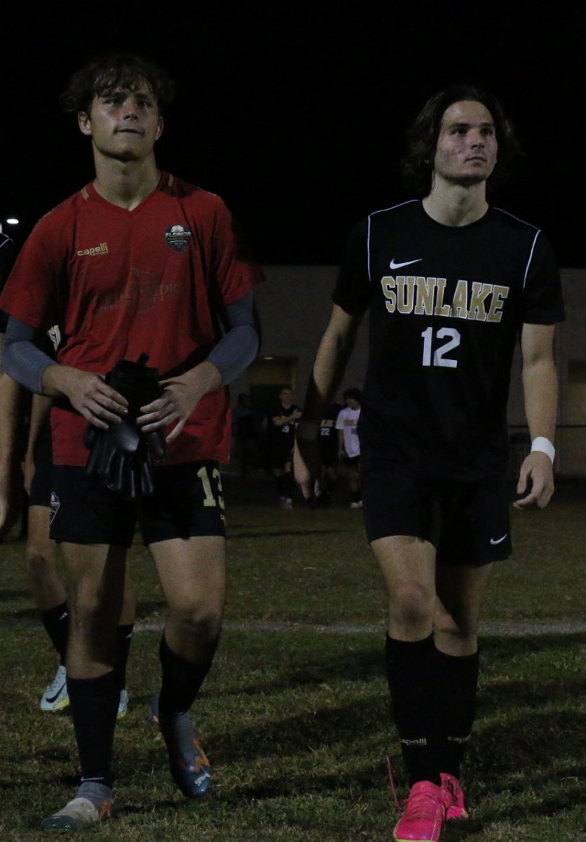 They dynamic duo! Evan Hinz and Nick Kriel walking out to the field, ready to dominate against their rivals.
