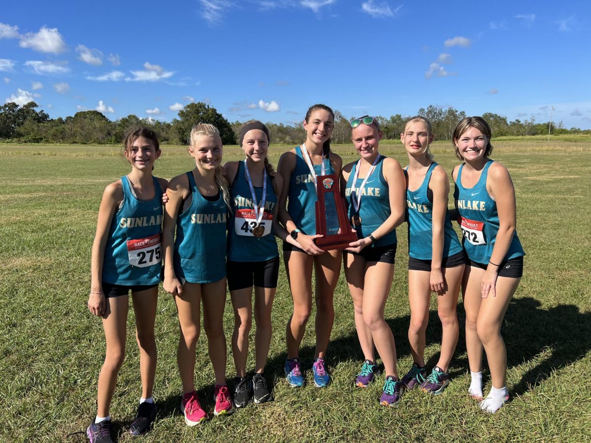 Last Thursday, the Sunlake cross country girls won a regional championship for the first time in school history. They won by 30 points, completely destroying their competition. Freshman Leah Foster was the fourth finisher on the team, helping to lower the team score and secure the win. Leah finished with a time of 20:29 and got 17th place in the region. Without Leahs strong finish, her team wouldnt have been able to win. She exclaims, Overall, I think I did pretty good in my race. Our team did great! We got 1st. Im so proud of all of the girls and their performances!