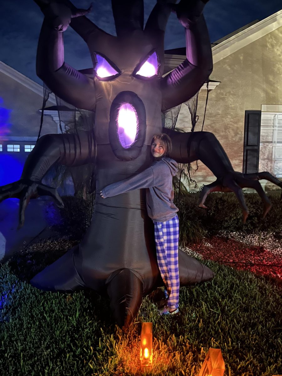 Junior, Ava Stiglic with the new giant inflatable outside her house. This is the house that shines during Halloween. ...my whole house is Halloween. said ava when explaining that her family goes all out for this Holiday.