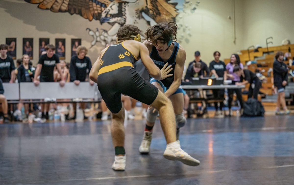 Macro Rivera at the Beauty and the Beast wrestling meet against Cypress Creek High School. This is his third year wrestling and hes dedicated to the sport.