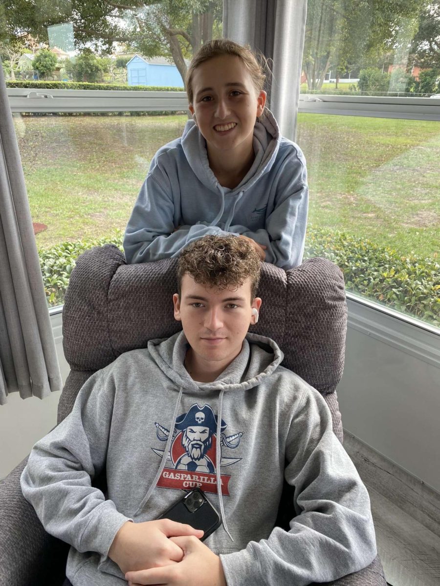 Freshman Lara Sterns with her brother. Hes off in college a lot of the time. She misses him a bunch and is so glad he made the trip for Thanksgiving with them this year. I love to spend time with him, she shared.