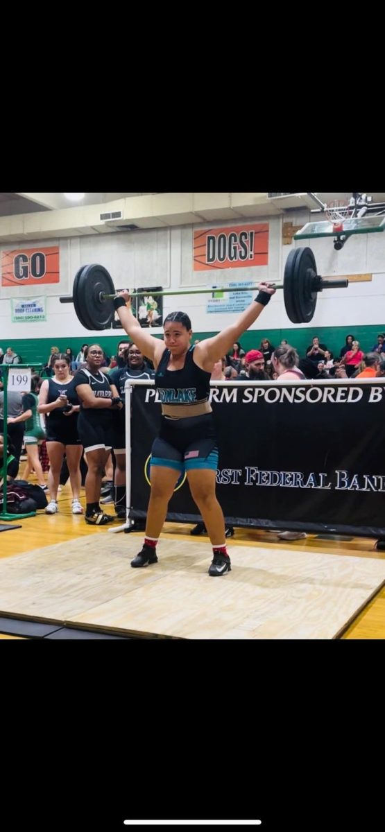 This is Giany lifting during the River Ridge meet on December 8th. She was happy because “…how I felt during my lifts was just how I needed to get at least one good lift.”