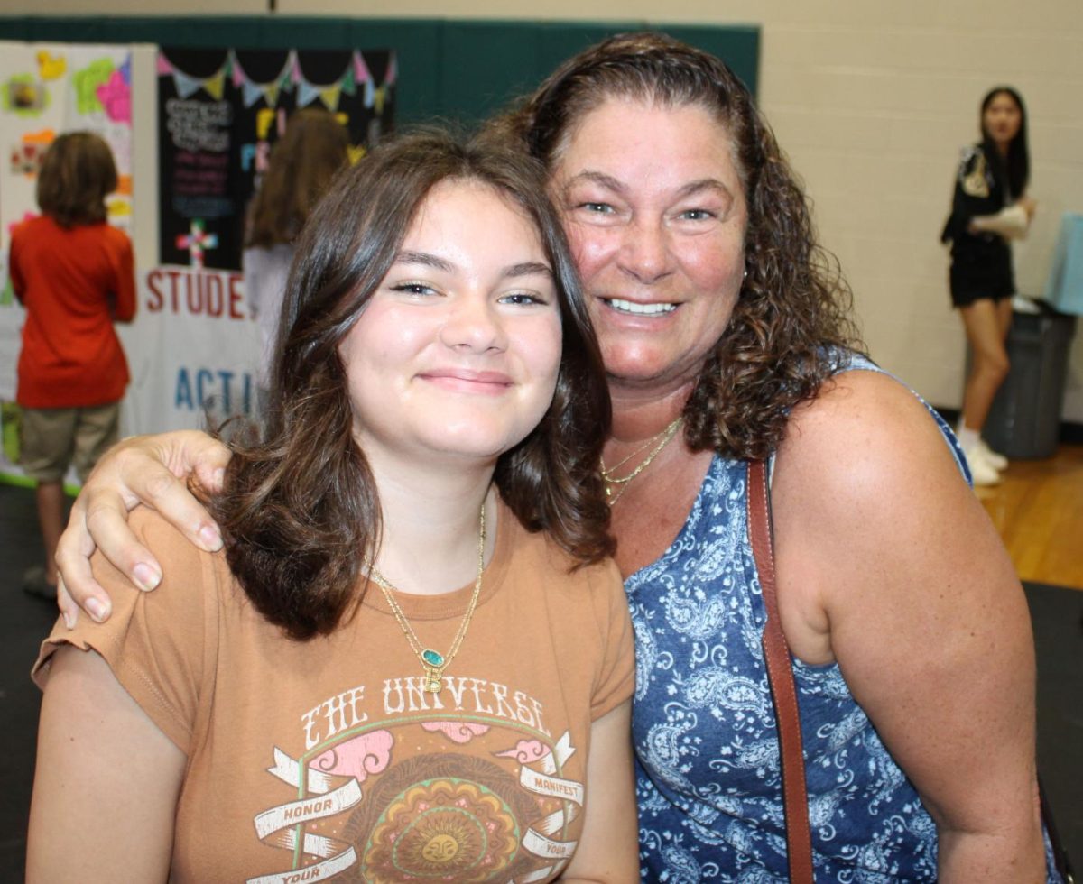 Here is Brianna posing with her mom, as they are both very excited to start Brianna's high school career. 