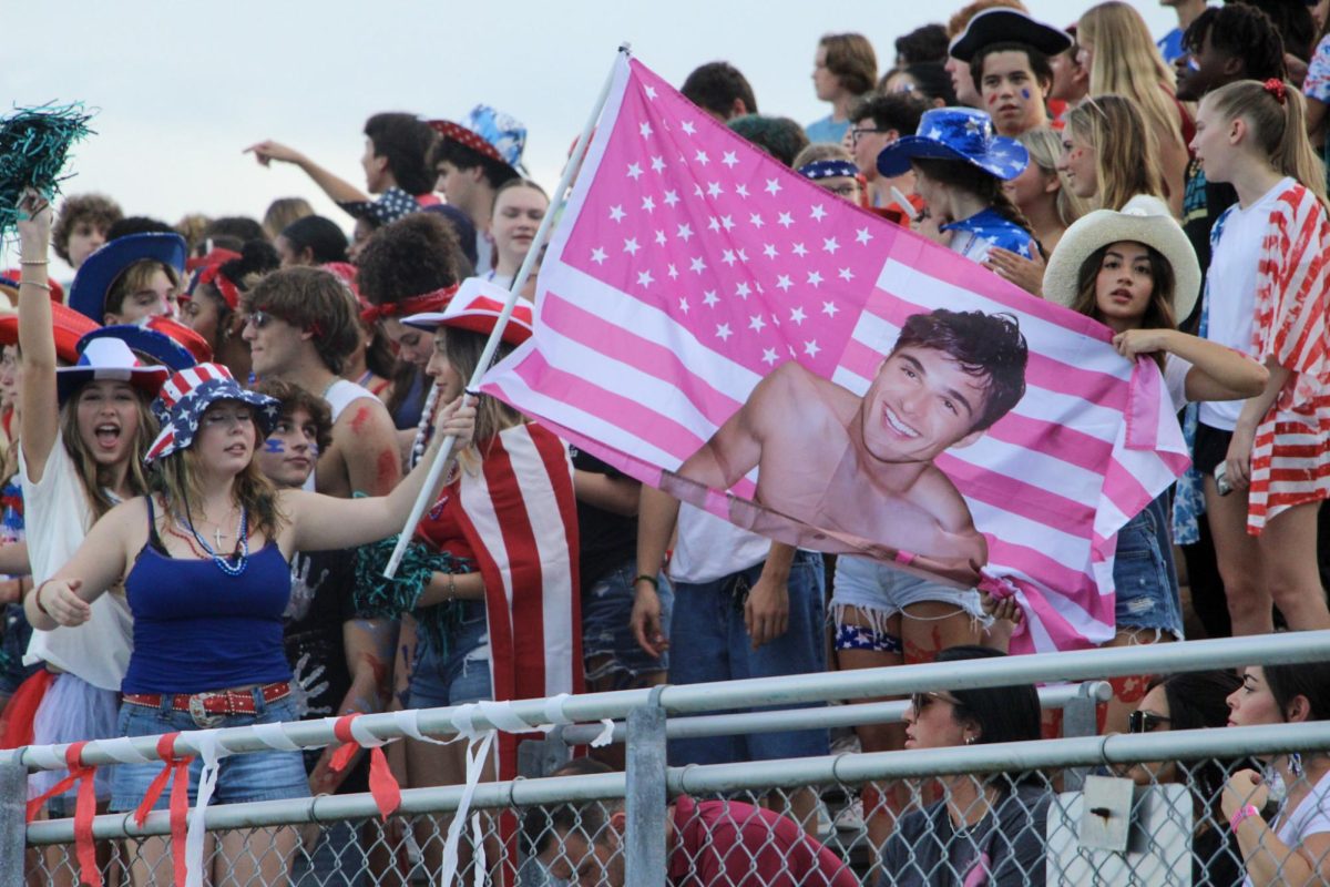 Students were in red white and blue from head to toe cheering for the varsity football team against the Anclote sharks. 