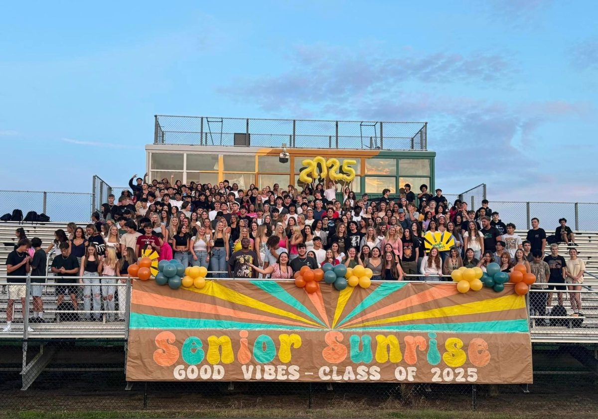 The seniors fill the bleachers with excitement and happiness during senior sunrise on their last first day as a highschooler. 