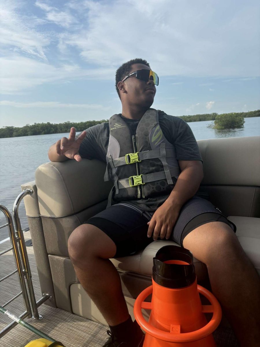 Junior Nathaniel Peguero at his AP Environmental Science Field Trip. This picture was taken while on a boat at the Energy and Marine Center. Nathaniel states "I had such an amazing time."