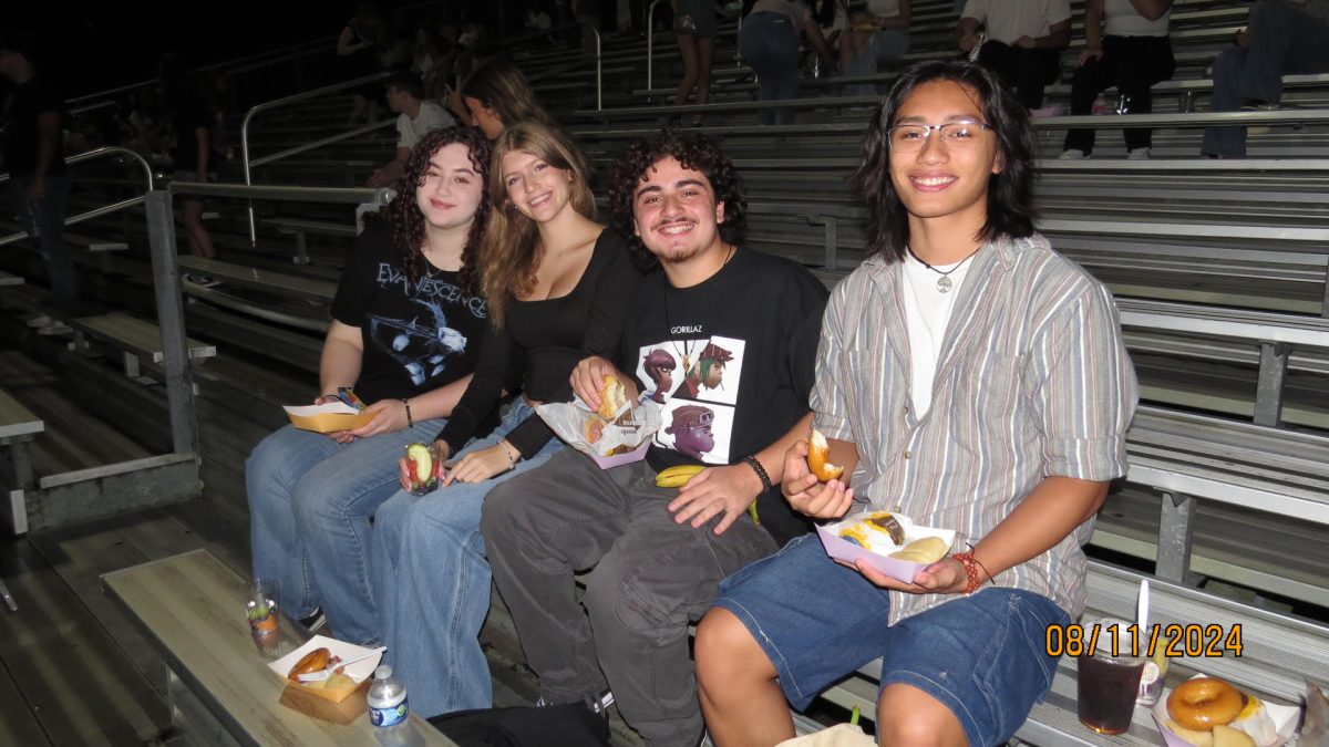 Caleb Cueva (right), Senior; hanging out with friends at Senior Sunrise. Photo was taken by Melissa Dahmer and used with permission. 9/9-13