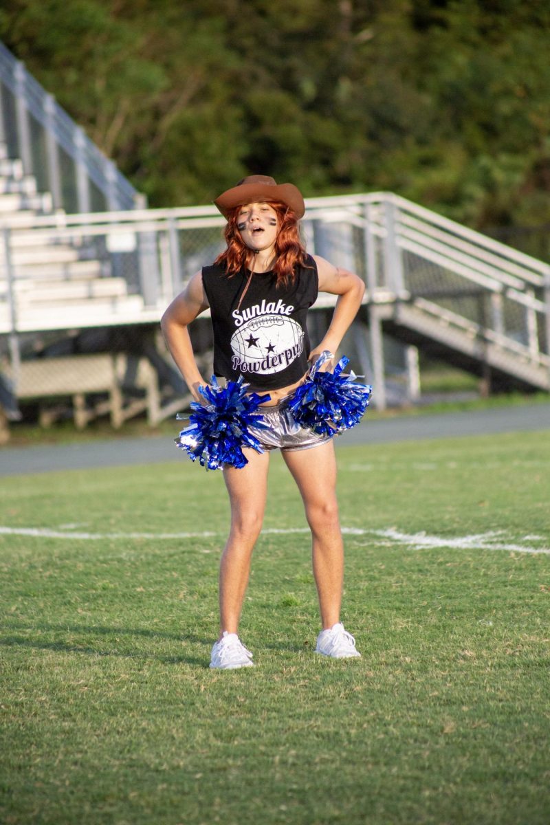 Ian laari during their big dance. He was  dressed as a Dallas cowboy cheerleader. He is apart of the junior class.