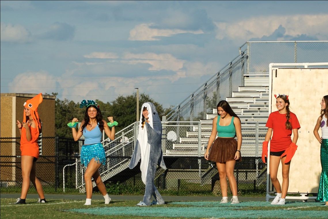 This is Luke Downey. He is in the middle dancing in the shark costume. He was the main hype man of the entire skit as he described.
Photo Credit: Ryan Carbonneau 