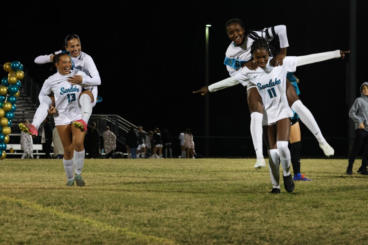 Madylena Perez and Adia Symmonds celebrating being seniors