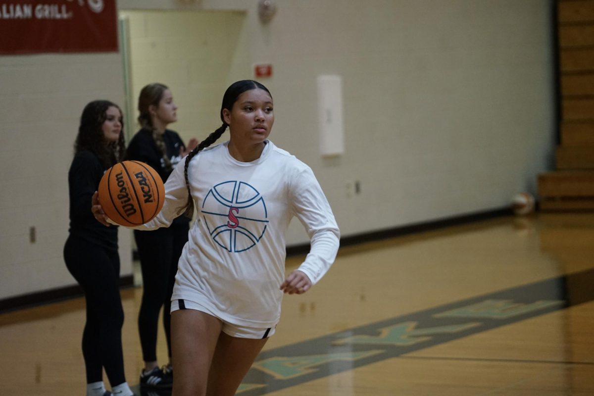 Junior, Adrienne Martin; Enjoyed winning the game aginst the Brooks Debartolo Collegiate high school. The girls varsity basketball team worked hard and brought their strengths together to win this game.