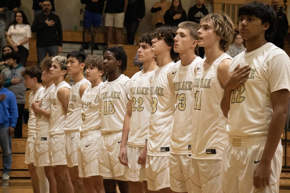 Chase Martin lines up alongside his teammates for Sunlake's boys basketball game against Central High School. 
12/9/24