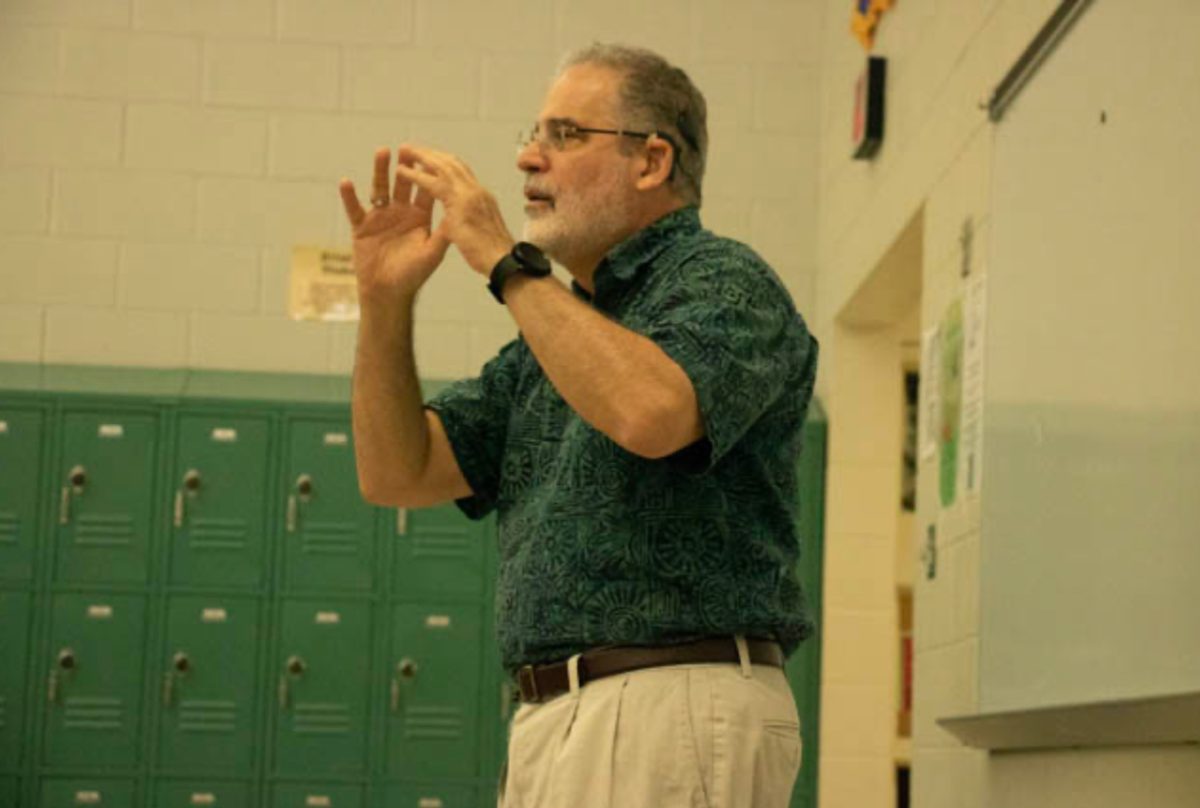 Speaker talking about Deaf experiences at the Great American teach in.