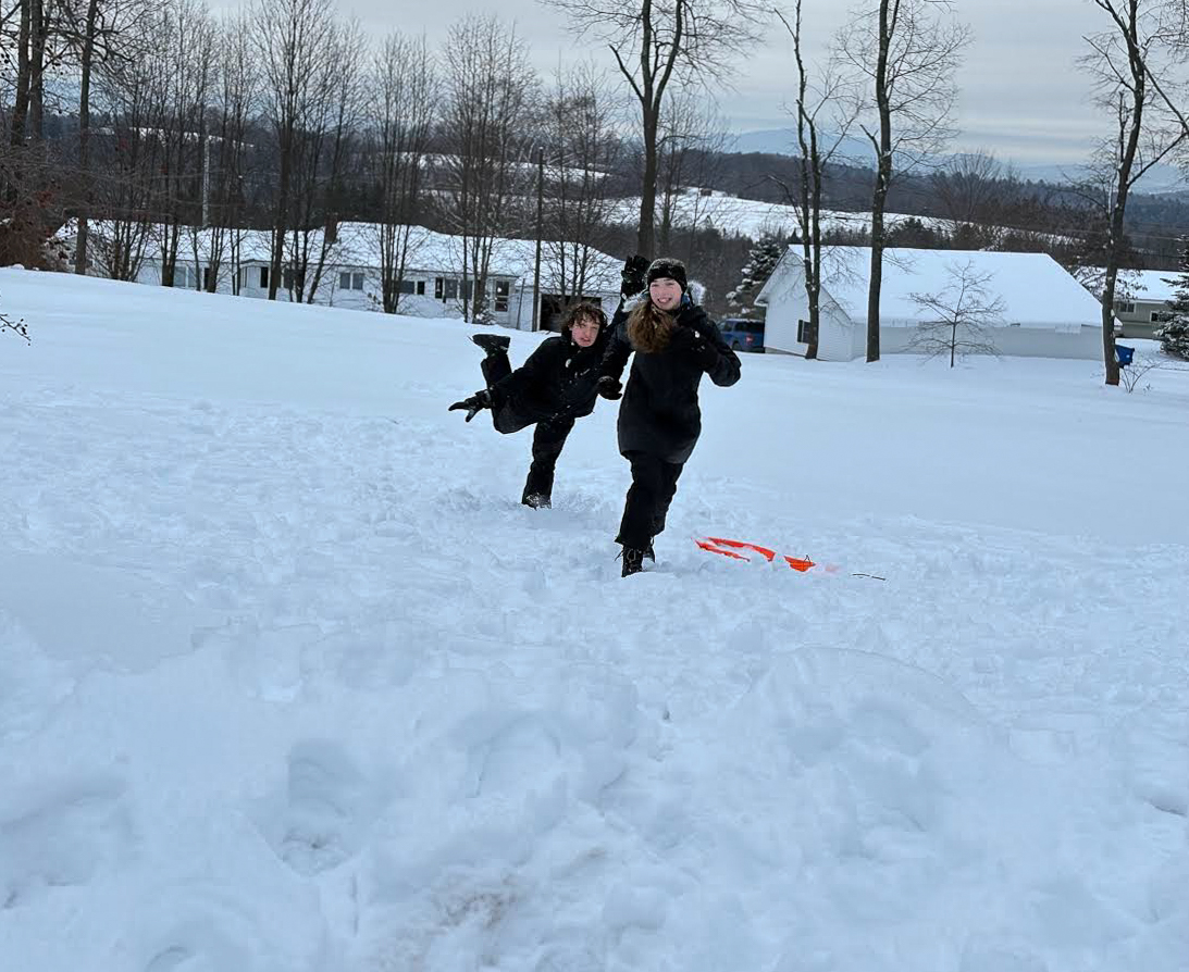 Isabella Gray being chased by her brother, Caleb Gray.