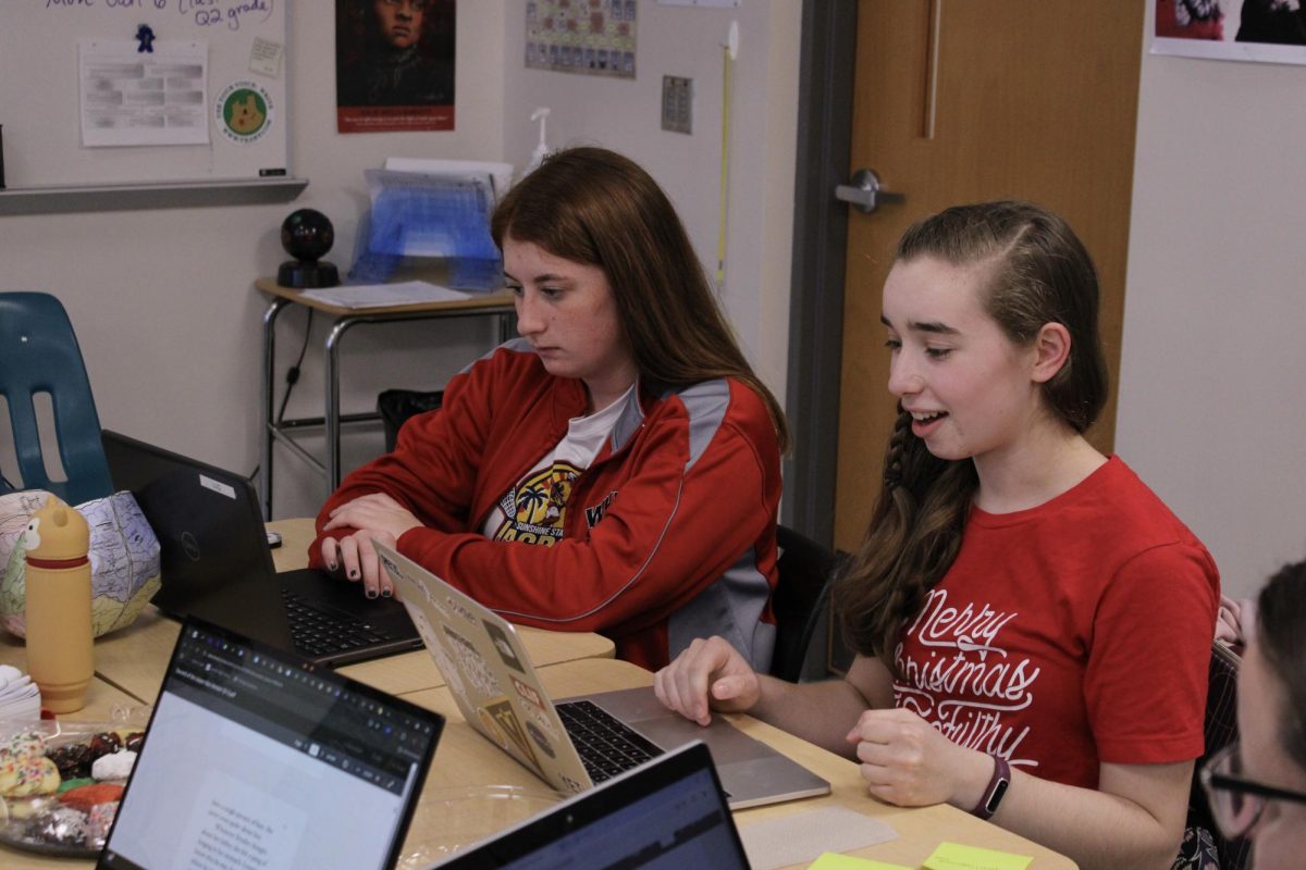 Junior, Naomi Lammers at the creative writing club. Naomi and her friends started this club because they enjoy writing and getting help from their peers. Naomi states, "Part of starting anything is continuing to experience and workshop until you find what's best."