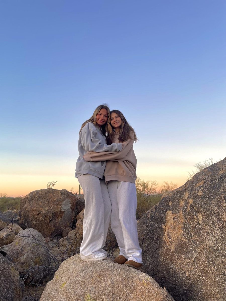 Sophomore, Leah Osikowicz; Enjoying the sunrise with her cousin. She enjoyed spending time with family and getting to see the amazing views in Arizona.