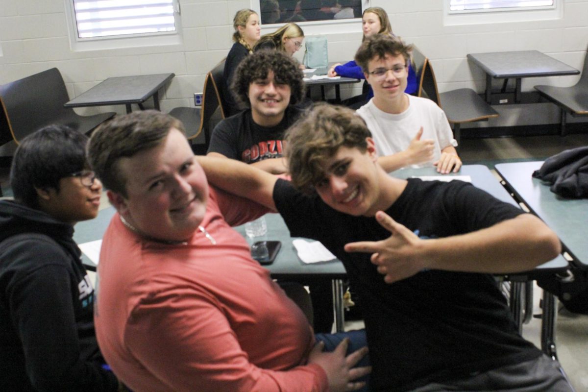 Sophomore Michael Lyons and his friends waiting for key club elections to be announced. 