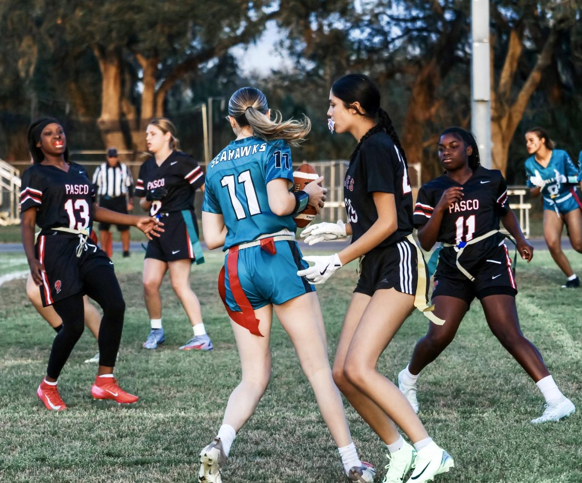 Miley Falby (#11) playing in the first flag football game.
