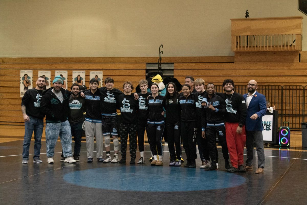 The Sunlake High School Wrestling Team gathered together for a picture on senior night. 