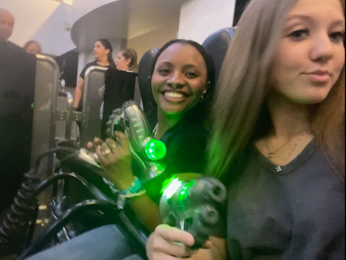 Makayla and Allyssa on a ride at universal studios for grad bash.