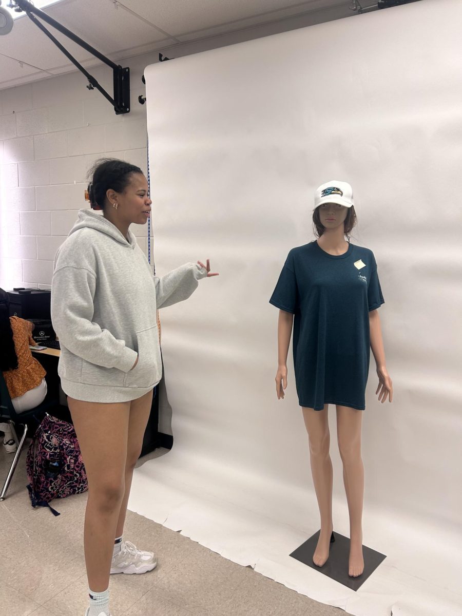 Sophomore, Sophia Sutton exploring the yearbook classroom realizing how much goes into photography. She is  excited to learn how to apply this throughout this year. 