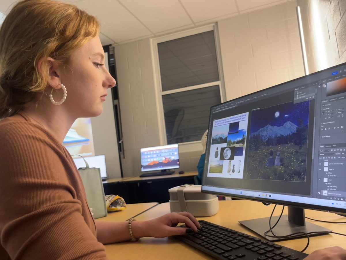 Here Ashlyn is editing a design image in photoshop.  
