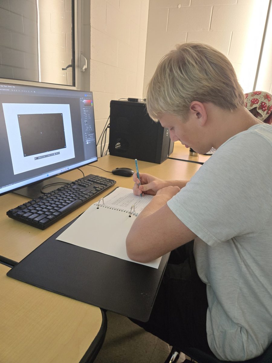 In this photo, Derek is seen writing, which is another one of his strong passions. “I love to be creative with my words and come up with unique ideas for my writings,” Derek says. With this passion, he is excited to be focusing on writing in the yearbook and create appealing articles for Sunlake’s students! 