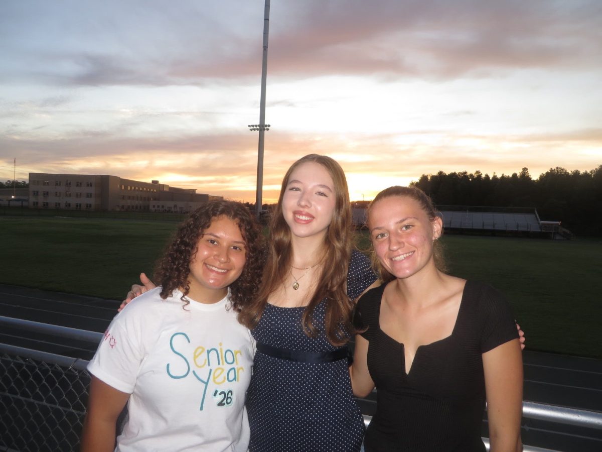 Senior Kailyn Ford (right) and her friend Jessica Romonosky (middle) and then Sophia Rodriguez Perez (left) at senior sunrise.