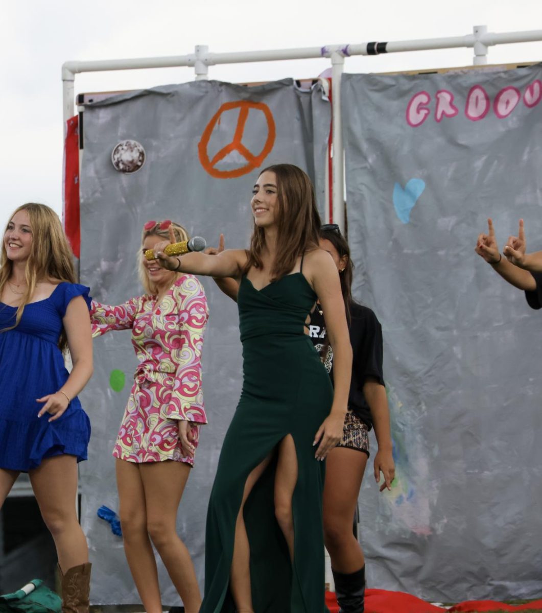 Sophomore Josie Deats dancing the night away for the annual homecoming skit. 