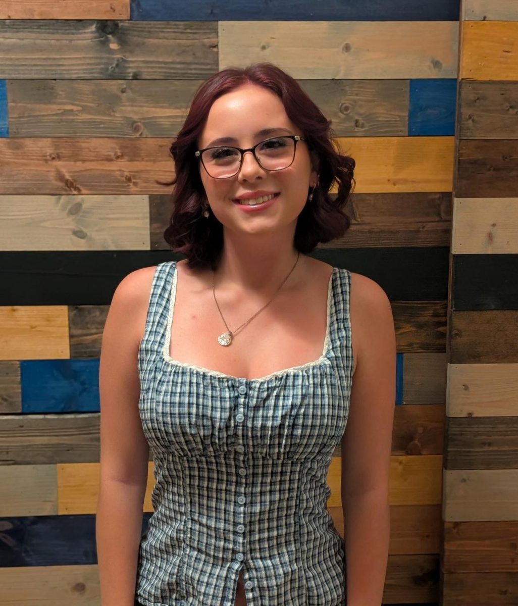 Junior Olivia Molloy posing for a picture on her first day of school. She has lot's planned for the new year! Olivia is involved in many clubs and is excited for her medical classes.