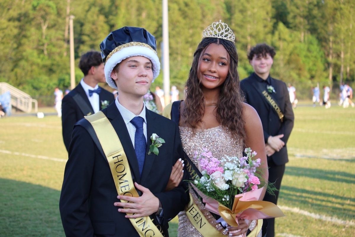 Briana Mcgregor and Ian Lari being crowned Homecoming King and Queen. Briana said, "I had so much fun and I'm so thankful i got to experience it."