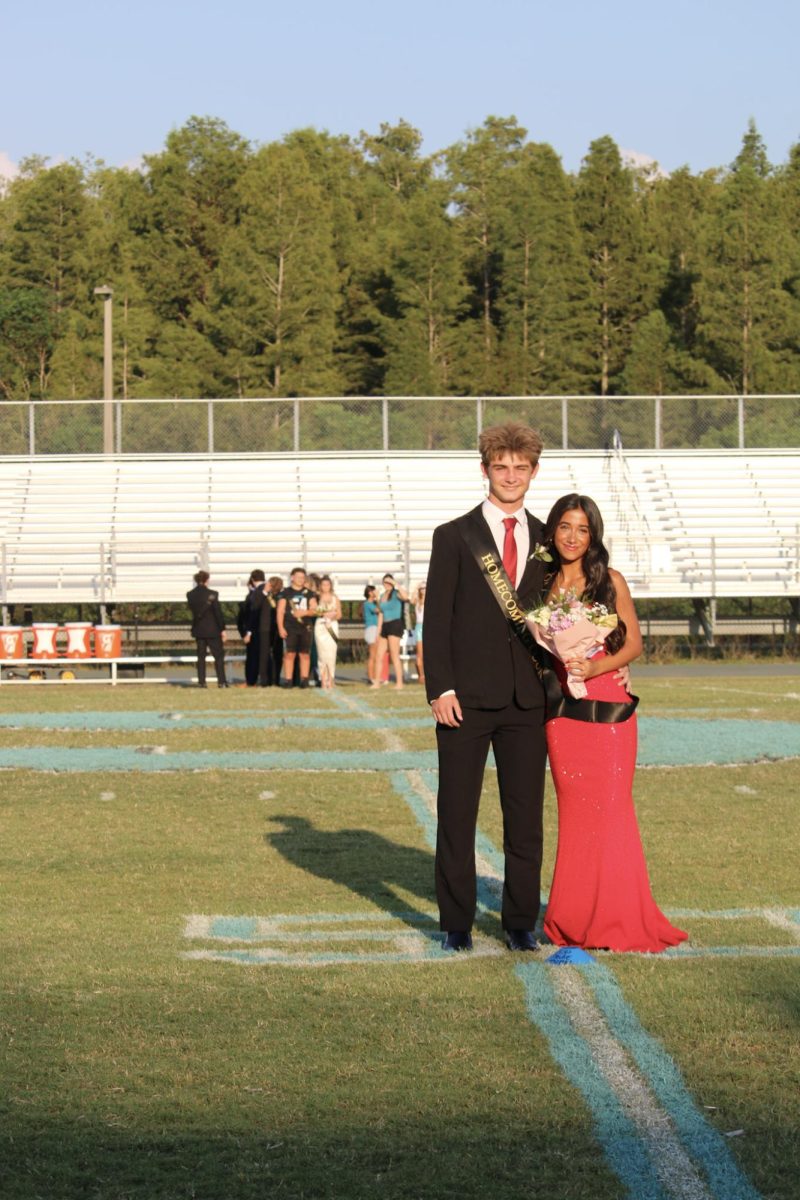 Alissa Brunton and Nathan Grob smiling for the photos. 