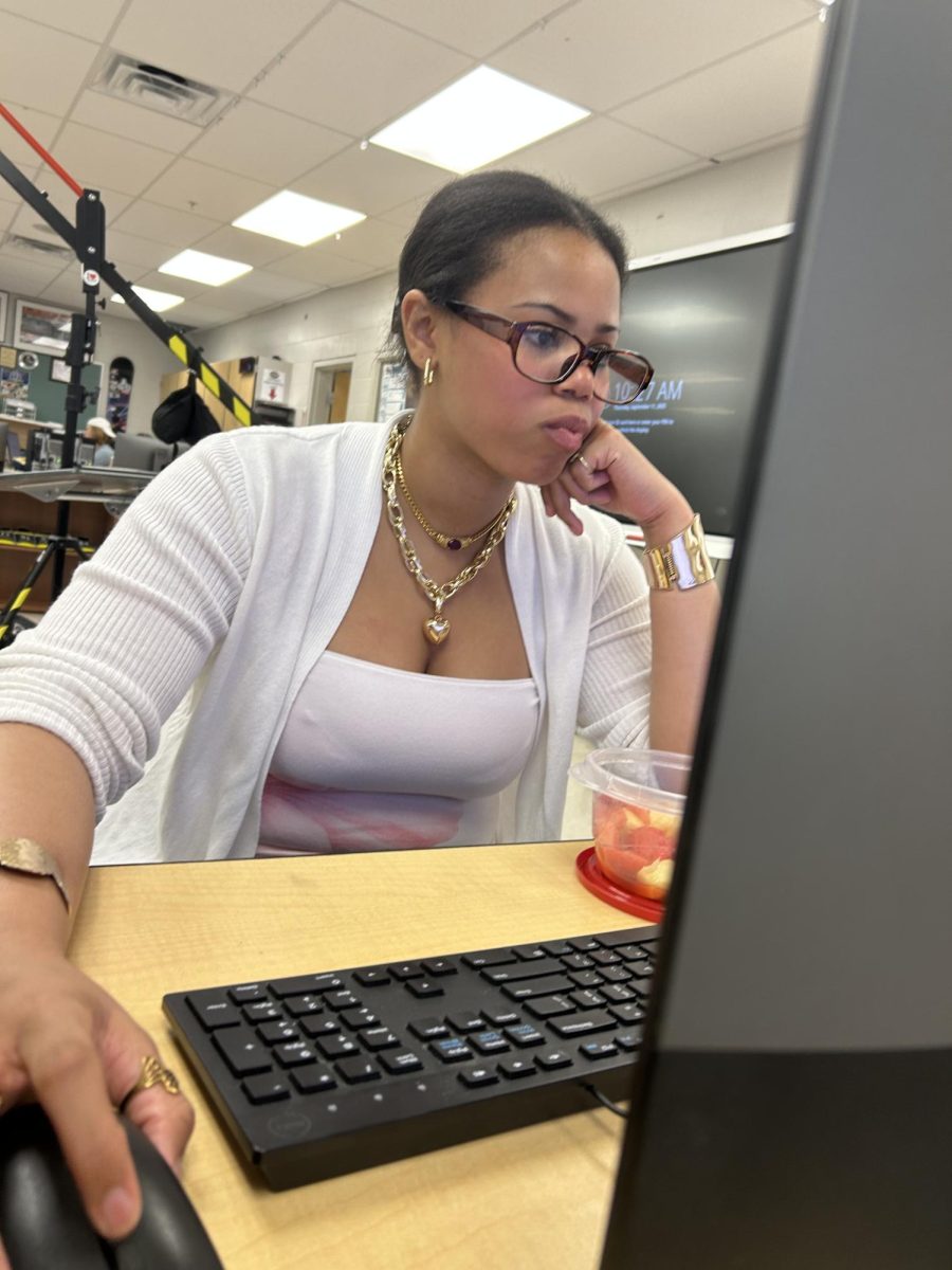 Sophia Sutton working hard in her yearbook class.