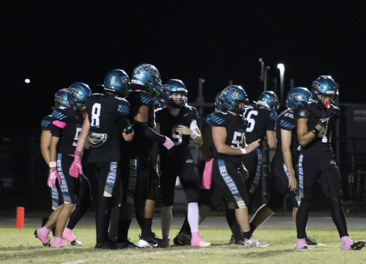 Senior; Hayes Mcguire (#9) Surrounded by his teammates at the Senior night game against Wesley Chapel.
