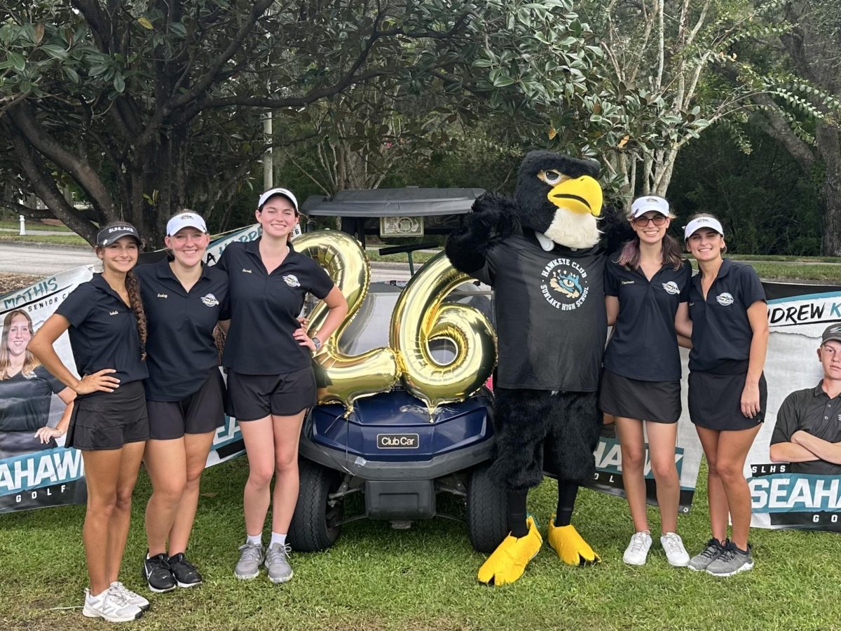 Sadey Mathis (Left side in the middle) at her senior night with the rest of the girls golf team.