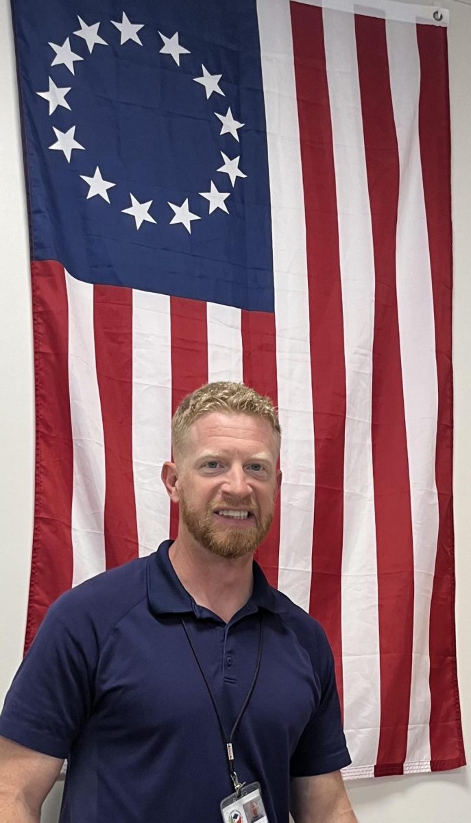Mr. Taylor is an APUSH teacher here at Sunlake. His class room features many versions of the American Flag including one with his face on it.