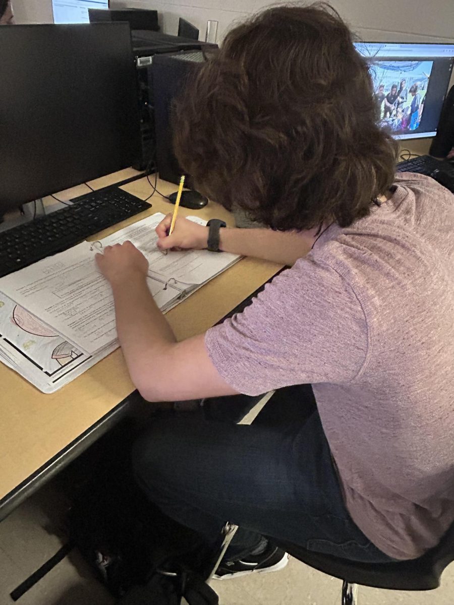 Here is a picture of Caleb Gray, working hard on classwork. 